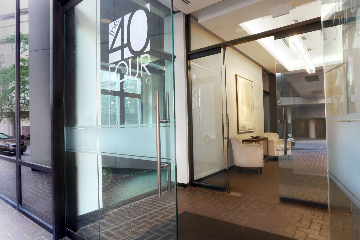 The 40 Four Building Designed by Foshee Architecture – Glass Doors at Front Entry