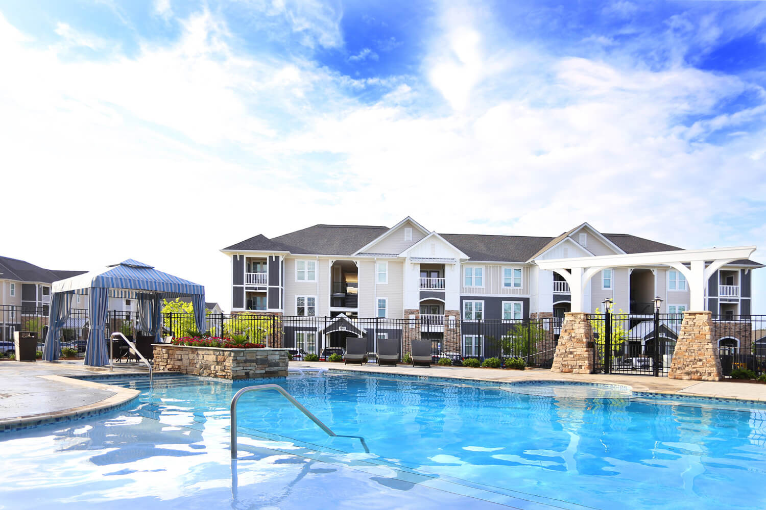 The Morgan Apartments Clubhouse Designed by Foshee Architecture - View of Pool Looking Towards the Apartment Buildings